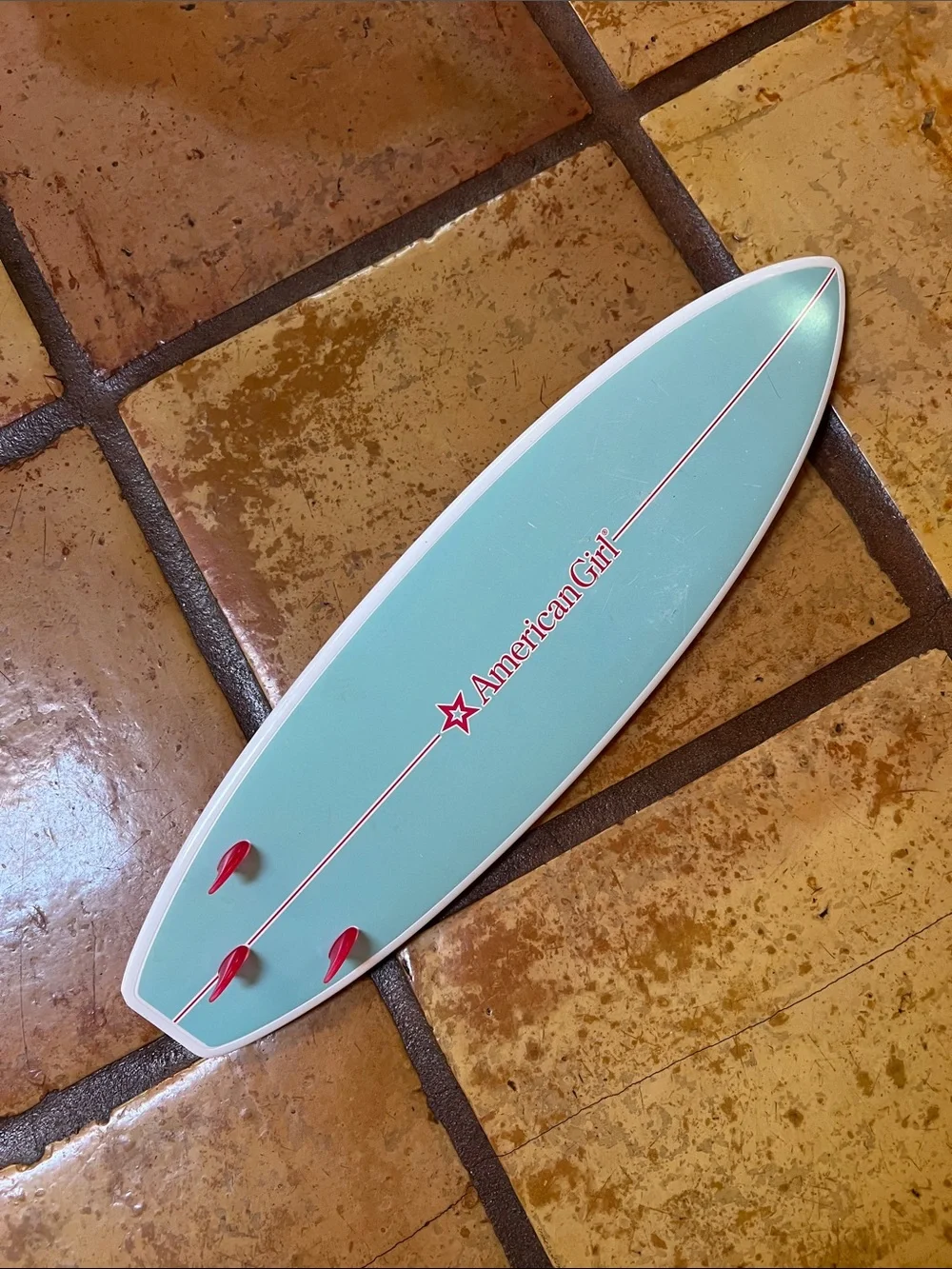 American Girl Joss Kendrick surfboard